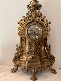 Orologio da tavolo/camino  stile barocco dorato.