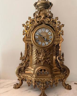 Orologio da tavolo/camino  stile barocco dorato.