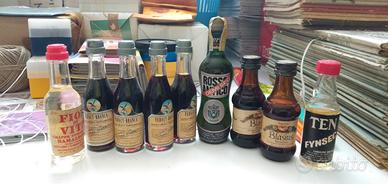 9 bottiglie mignon liquore piene antiche