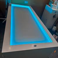 Lettino in corian con doccino riscaldante cromote