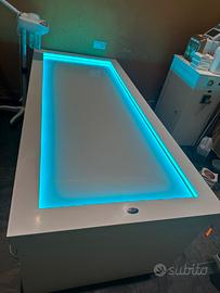 Lettino in corian con doccino riscaldante cromote