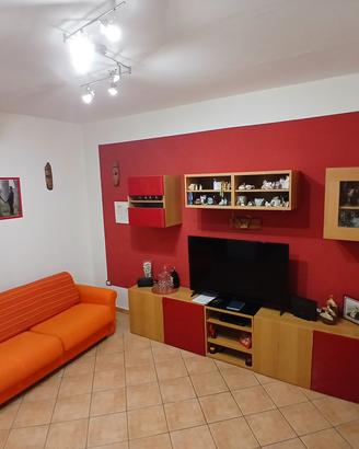 parete attrezzata e divano letto