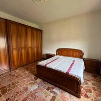 Camera da letto completa in legno massello