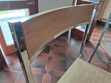 Sedie in legno e acciaio