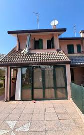 TRILOCALE CON AMPIO GIARDINO PRIVATO E POSTO AUTO