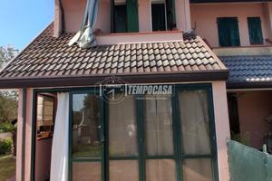 TRILOCALE CON AMPIO GIARDINO PRIVATO E POSTO AUTO