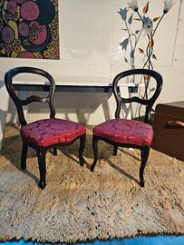 Coppia di antiche potrone in stile