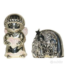 Coppia di statuette natalizie in metallo argentato