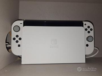 Nintendo Switch OLED + 5 Giochi + Accessori