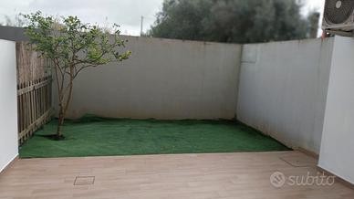 Bilocale con giardino