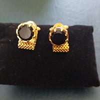 Gemelli in finto oro giallo con pietra centrale