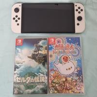 nintendo switch oled + due giochi + cover rigida
