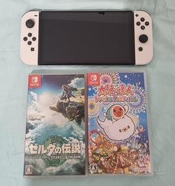 nintendo switch oled + due giochi + cover rigida