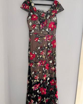 Abito elegante lungo da donna floreale velato.