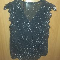 Top/Blusa con sfondo nero e stelle