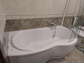 vasca con box doccia  e rubinetteria dolomite