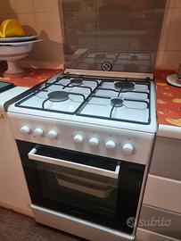 Cucina a gas con forno elettrico CANDY