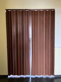 Porta a soffietto con chiusura magnetica