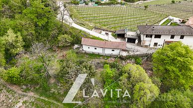 Casa con terreno a Roveré della Luna