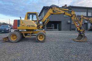 Escavatore gommato Komatsu Pw110
