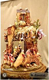 Presepe circolare su base di legno lavorato