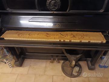 Pianoforte verticale antico nero marca Roeseler