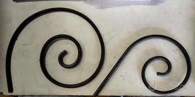 Ricci a spirale in ferro battuto