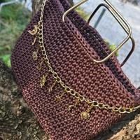 borsa con ciondoli oro