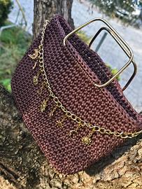 borsa con ciondoli oro