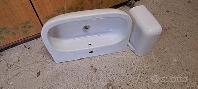 lavabo e copri sifone in ceramica