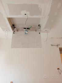 botola motorizzata a scomparsa per TV 