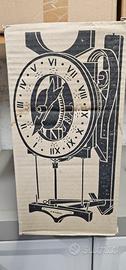 orologio antico a pesi