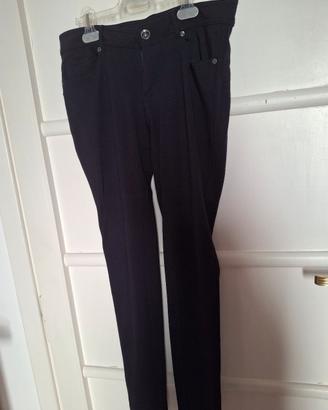 Leggings blu con cerniera e taschini dietro