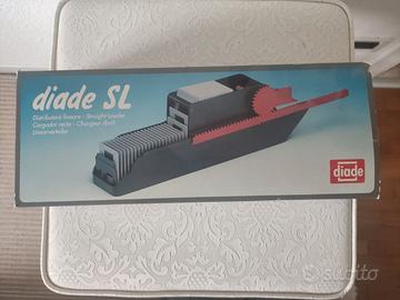 Distributore lineare per diapositive