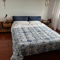 Letto matrimoniale con testiera e moduli contenito
