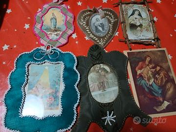 Cornici in tessuto e legno e quadri religiosi