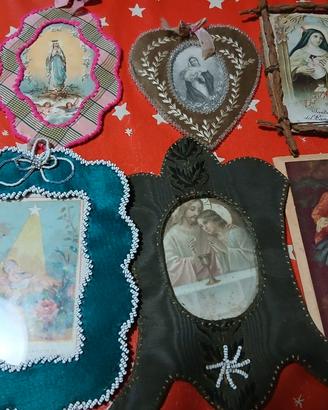 Cornici in tessuto e legno e quadri religiosi