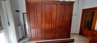 Camera da letto legno massiccio in noce 
