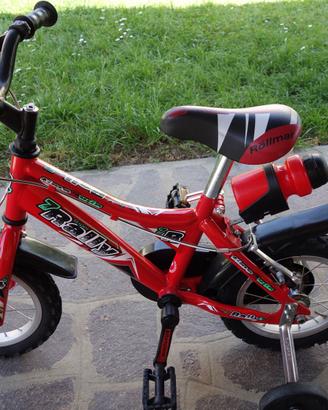 Bicicletta rally rossa per bambino da due/tre anni
