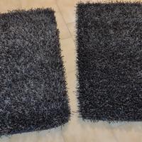 Tappeti grigi e neri