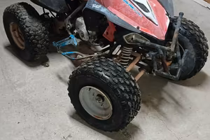 quad 125