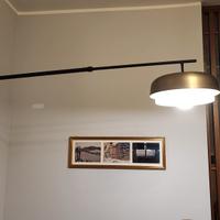 Lampada da parete orientabile in ferro Clepsos