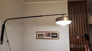 Lampada da parete orientabile in ferro Clepsos