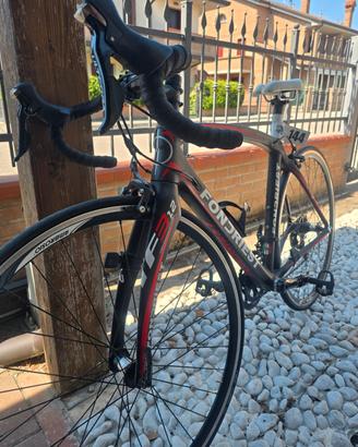 BICI DA CORSA E RULLI