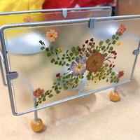 Portacandele metallo e vetro con fiori secchi