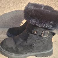 stivaletti neri con pelliccia donna 