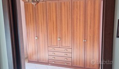 armadio 6 ante piu 4 cassetti 