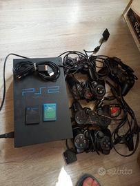 Playstation 2 + 5 joystick + 2 memory card