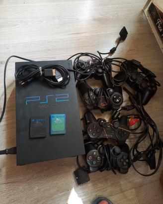 Playstation 2 + 5 joystick + 2 memory card