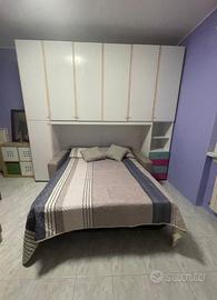 Camera singola con bagno privato e angolo cottura